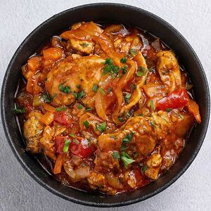 Куриное филе в кисло-сладком соусе и овощами