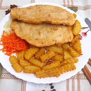 Отбивная из куриного филе с гарниром