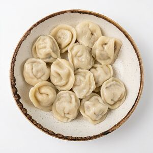 Пельмени мясные со сметаной
