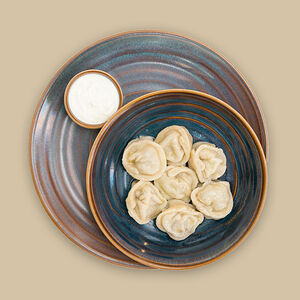 Пельмени с курицей и сыром