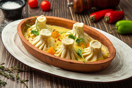 Хинкали с тыквой, сулугуни и тархуном