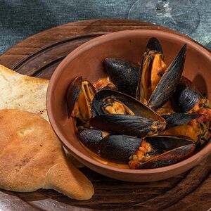 Мидии в томатно-сливочном соусе 