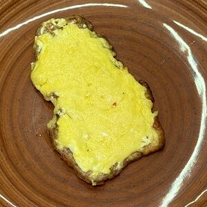 Свинина, запеченная с сыром и грибами