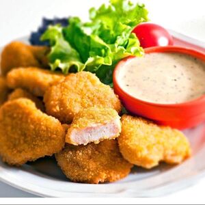 Куриные наггетсы с белым соусом
