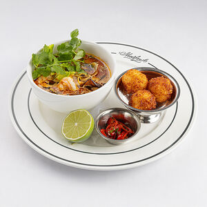 Том ям с морепродуктами