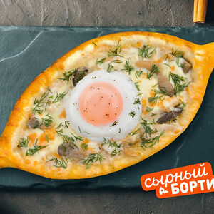 Лодочка с жюльеном и яицом пашот