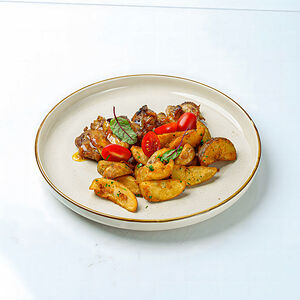 Куриные бедрышки под апельсиновым соусом и запеченным картофелем
