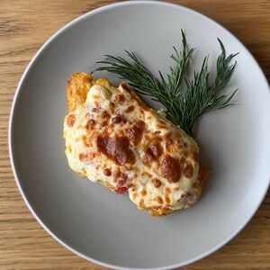 Куриное филе под сыром с томатами