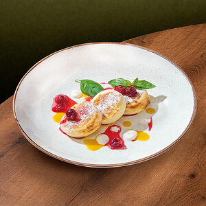 Сырники с вишней и соусом манго