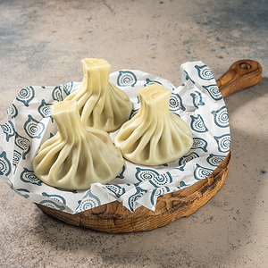 Хинкали с соусом том ям