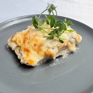 Филе хекка с грибами под сыром