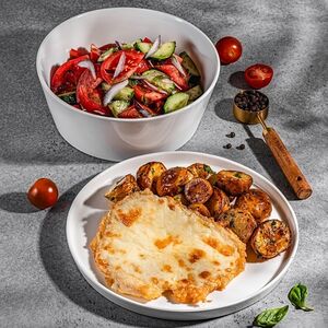 Отбивная с сыром, молодой картофель и салат из свежих овощей