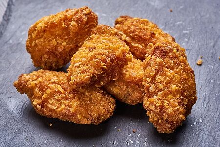 Куриные крылышки острые в панировке