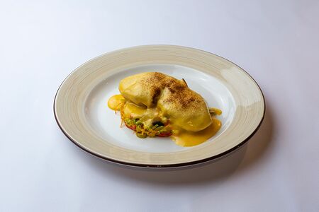 Филе индейки на подушке из овощей