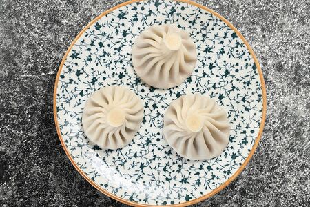 Хинкали с крабом и томатами