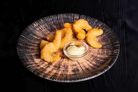 Жареные креветки в панировке