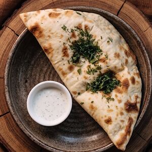 Чуду с жареным картофелем и луком