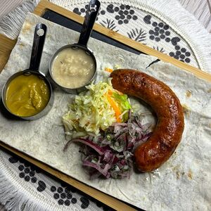 Колбаски на гриле 