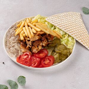 Шаурма свиная на тарелке