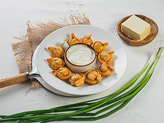 Пельмени мясные жареные