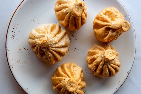 Жареные хинкали с бараниной