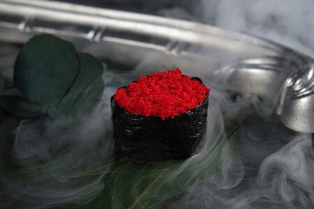 Спайси суши с икрой летучей рыбы 