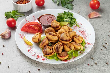 Пельмени жареные