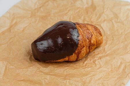 Круассан покрытый с шоколадом