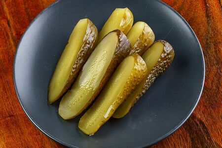 Огурцы солёные