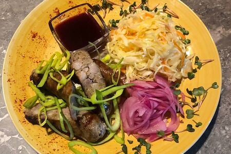 Пивные колбаски с тушеной капустой