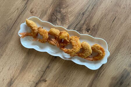 Креветки в кляре с соусом терияки