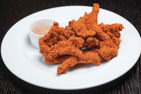 Острые куриные крылышки в панировке