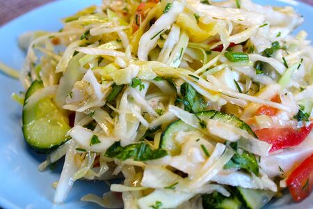 Салат из молодой капусты