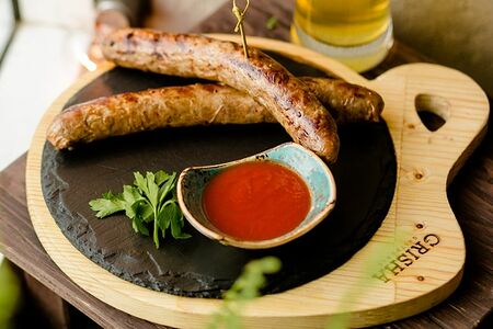 Колбаски на гриле