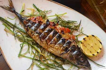 Скумбрия, фаршированная овощами