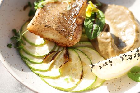 Палтус на подушке из кабачка