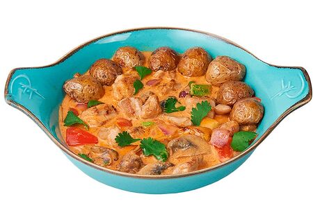 Куриное бедро с овощами в соусе том ям