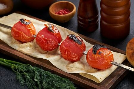 Томат на мангале