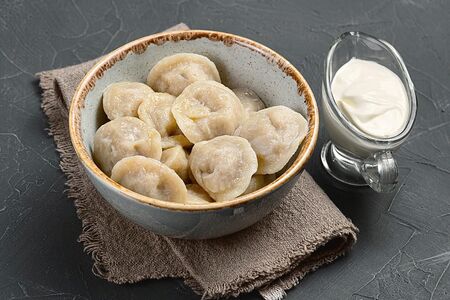 Пельмени с лососем и сливочным маслом