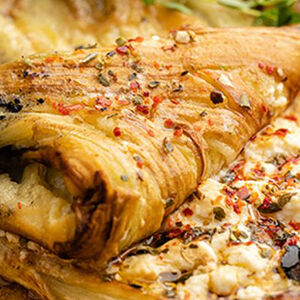 Баклажан запечённый с сыром из козьего молока и сливочным маслом