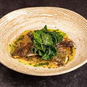 Филе дорадо Josper с соусом Acqua pazza