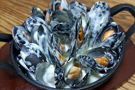 Мидии в сливочном соусе