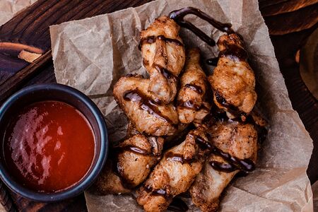 Куриные крылья в соусе BBQ