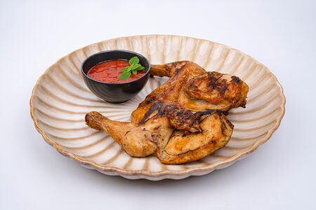 Запеченный цыпленок с томатным соусом