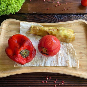 Томат на мангале