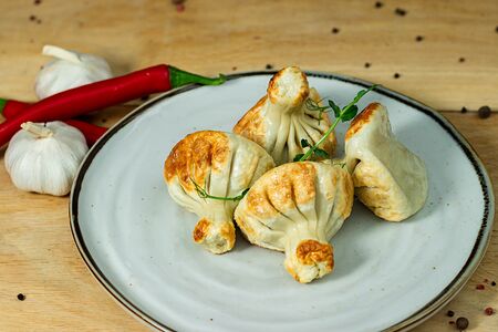 Жареные хинкали с бараниной