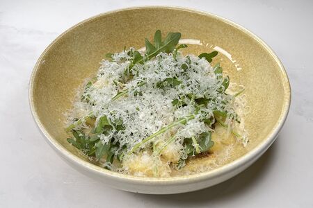 Ньокки с сыром Таледжио, цукини и рукколой