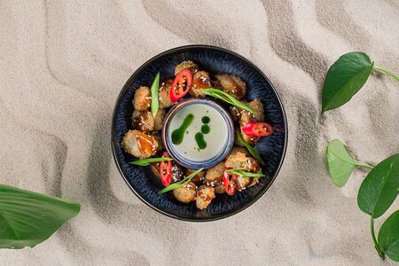 Жареные оливки с халапеньо