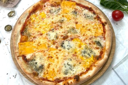 Пицца четыре сыра