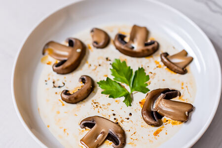 Шампиньоны в сливочном соусе